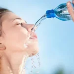 5e58d0bc7f4ca-women-dont-know-how-to-drink-water-stock-photos-thumb.webp