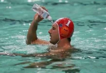Swimmer-Pours-Water-On-Himself-1024x705.webp