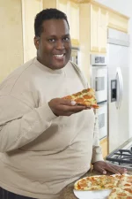 depositphotos_21791719-stock-photo-man-holding-slice-of-pizza.jpg